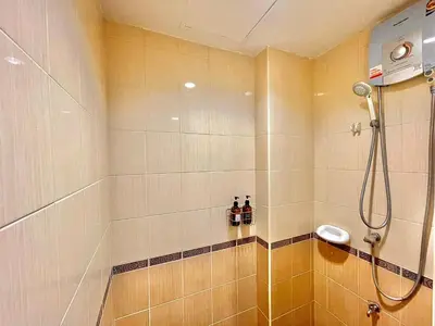 a bathroom with a shower with two bottles of alcohol at S52 Near On nut BTS 300m*7-11 in Phra Khanong