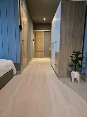 a bedroom with a bed and a potted plant at Bangkok vibe, City House, 7 mins to BTS, City center, Private room in Sathon, Private bathroom, Bangkok, Thailand in Bangkok
