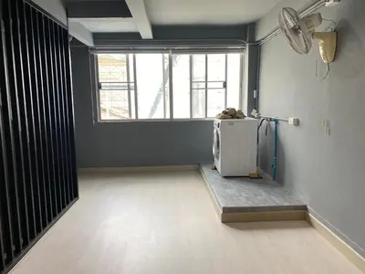 an empty room with a refrigerator and a window at Chiangmai vibe, City House, 7 mins to BTS, City center, Private room in Sathon, Private bathroom, Bangkok, Thailand in Bangkok