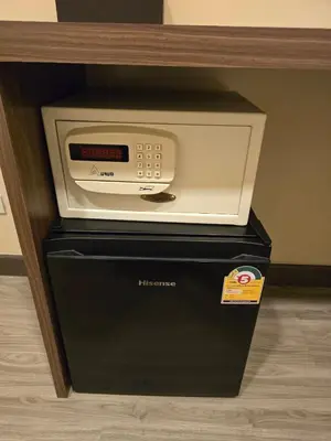 a microwave oven sitting on top of a black box at Victory place 2 (Golden Mount) in Bangkok