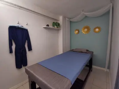 a small room with a bed with a blue mattress at Fall Asleep hotel in Nonthaburi