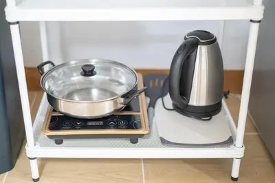 a pot sitting on top of a stove at Chummy House Khaosan 10-Min, Peace Haven in Bangkok