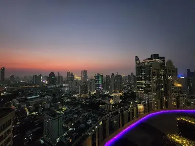 a view of a city at night with at Sathorn prime Panorama City View rooftop bar in Bangkok