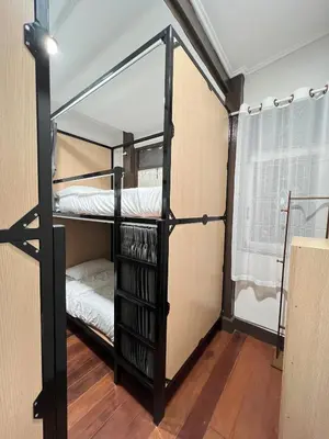 a bunk bed room with two bunk beds at House Ju in Bangkok