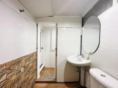 a bathroom with a sink and a mirror at Chubby 5 Room 4 in Ban Bang Bamru