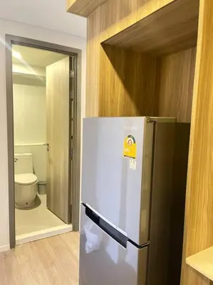 a refrigerator in a room with a toilet at Siamese 87 2BR \u7d20\u5764\u9038 BTS On Nut LOFT \u4e24\u623f 25 in Bangkok