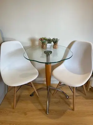 two white chairs and a glass table in a room at OP Open View เมืองทอง T12 impact muang thong thani in Ban Bang Phang