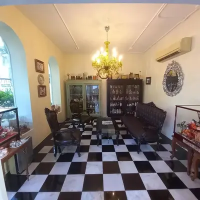 a living room with a checkered floor at Chezmoi Bangkok Sukhumvit 26 Private Executive Residence 444 in Khlong Toei