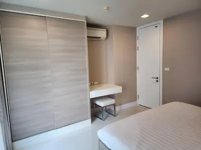 a bedroom with a bed and a sink and a desk at Condominium - Sukhumvit Soi 5 BTS Nana- Room Size 50m2 in Bangkok