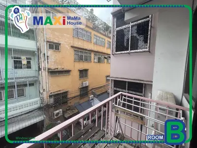 a balcony view of a building with a window at MAXi MaMa Room in Bangkok