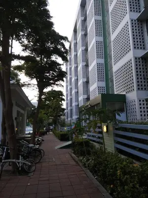 a sidewalk in a city with tall buildings at Savi Rooms Deluxe 3 Nr Bangkok piyavet Hospital in Bangkok