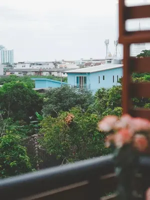 a view from a window of a blue building at The Giftown Bangkok, Talat Phlu in Thonhuri