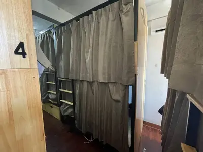 a room with a curtain on the side of a room at Happy Hope in Bangkok