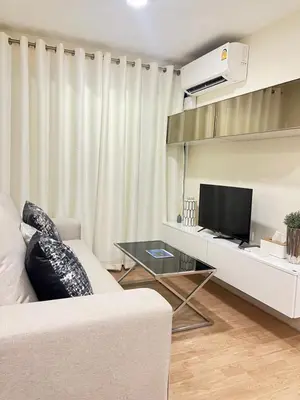 a living room with a couch and a tv at The Forest Building A-more than3nights stay-self checkin checkout in Bangkok