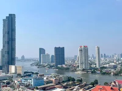 a view of a city with a river and buildings at Luxurious Downtown River View chao phraya river in Bangkok