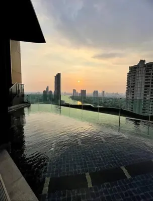 a view of a building with a pool of water at Luxurious Downtown River View chao phraya river in Bangkok