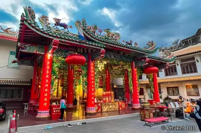 a temple in a city with red columns at xx HD Yaowarat Road BKK in Samphanthawong