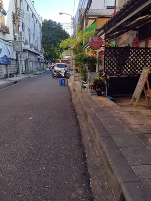 a street with a motorcycle parked on the side of the road at 362 สวนอ้อย5 in Dusit