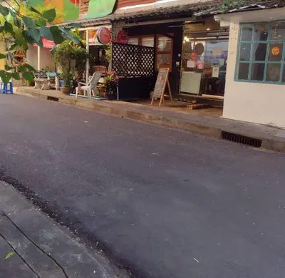 an empty street in front of a store at 362 สวนอ้อย5 in Dusit