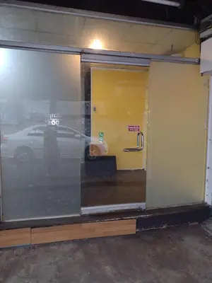 a window with a car in a parking lot at 362 สวนอ้อย5 in Dusit
