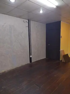 an empty room with a black door and a wall at 362 สวนอ้อย5 in Dusit