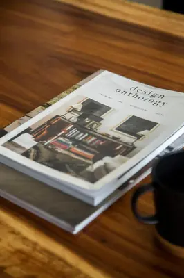 a book sitting on top of a table at Parrish Serviced Apartment in Bang Mote