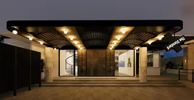 a lobby of a building with a door and lights at The StandardX, Bangkok Phra Arthit in Bangkok