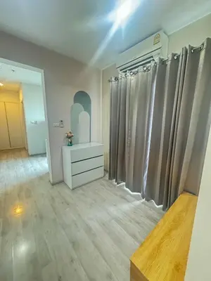 a room with curtains and a dresser and a mirror at Minimal 2 BR next to IKEA, Central Westgate Bangyai in Ban Bang Krabu