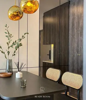 a dining room with a table and two chairs at Luxury room in Ban Khlong Bang Chak
