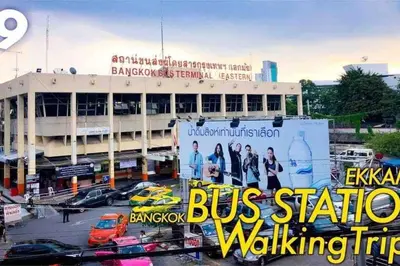 a building with a billboard in front of it at 5BR House 8Beds, Ekkamai BTS 12mins walk, 711, shopping mall in Bangkok