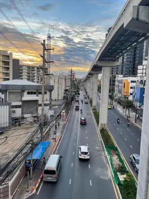 a busy city street with cars on a highway at We Resident in Ban Bang Toei (1)