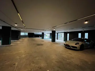 a car parked in an empty parking garage at We Resident in Ban Bang Toei (1)
