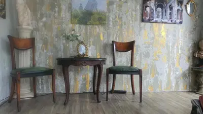 a table and two chairs and a table with a mirror at Style Jaritz in Ban Bang Phai
