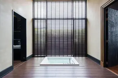 a room with a pool in the middle of a room at Luxury Pool Villa with Jacuzzi & Lift by Thonglor in Bangkok