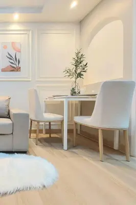 a dining room with a table and two chairs at Joyful room in Ban Song Hong