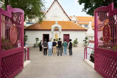 a group of people standing in front of a building at Lamoon Vivit in Bangkok