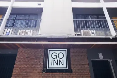 a go inn sign in front of a building at XX GO INN BTS Surasak Silom bkk โกอินน์ บีทีเอส สถานีสุรศักดิ์ in Yan Nawa