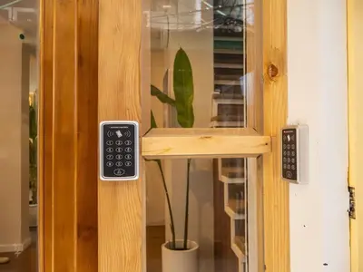 a door with a remote control attached to it at Cozy 2-bedroom apartment in Silom city center - 6A in Bang Rak