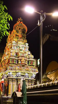 a large ornate building with a street light at PanPan Hostel in Bangkok