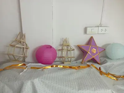 a bed with a pink ball and other decorations on it at Bangkok Siam in Bangkok