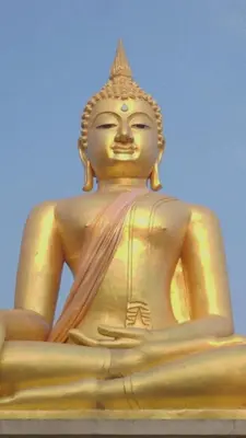 a large golden buddha statue sitting on the ground at Bangkok Siam in Bangkok