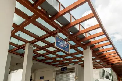 awning over the entrance to a building at Cozy Corner Bangpho in Bang Su