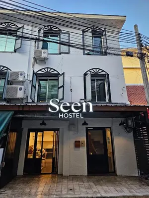 a building with a sign that reads sean hospital at Seen Hostel Bangkok The Riverwalk in Bangkok
