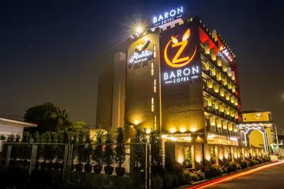 a hotel with a sign on the side of it at Baron Zotel Bangkok SHA PLUS in Bangkok