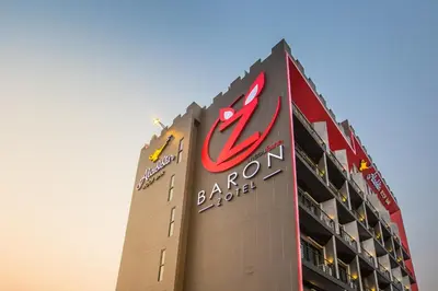 a sign on the side of a building at Baron Zotel Bangkok SHA PLUS in Bangkok