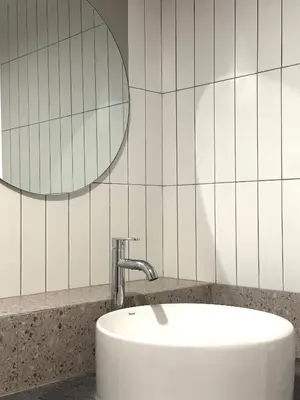 a bathroom with a sink and a mirror at Lune bangkok in Bangna