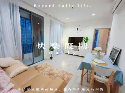 a living room with a couch and a table in a room at Close to onnut bts condo in Bangkok