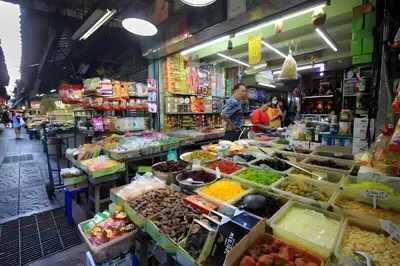 a market with a variety of fruits and vegetables at XX Hidden Dragon ChinaTown MRT Wat Mangkon Station in Samphanthawong