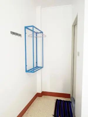 a room with a mirror on the wall at Vonden Garden by Merry V in Bangkok
