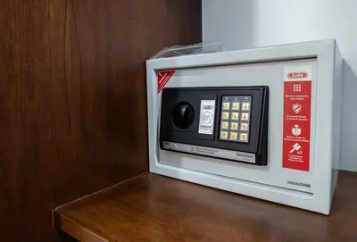a microwave oven sitting on top of a table at BB Boutique Sathorn in Bangkok